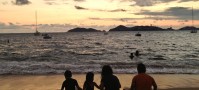 Sunset over Acapulco with kids