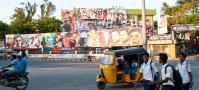 Movie posters decorate the streets of Pondi